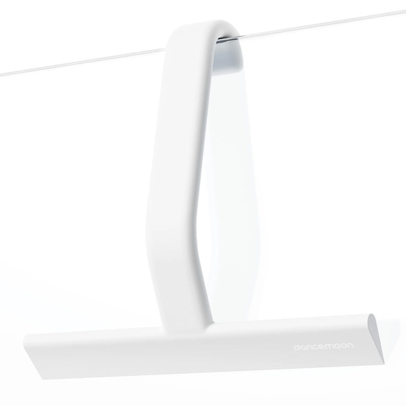 White JustHang shower squeegee removing water from a glass shower door