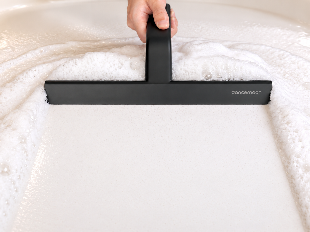 Black dancemoon shower squeegee in a bathroom
